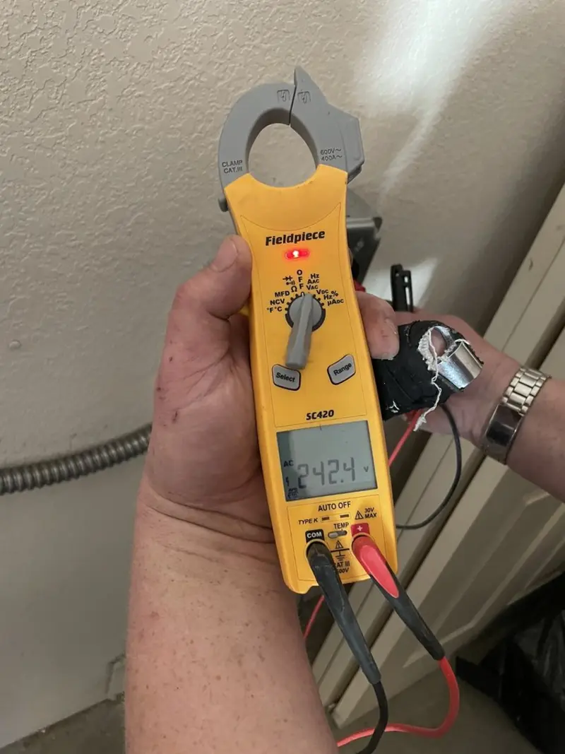 Voltage testing with clamp meter during Generator Installation in Penn Hills
